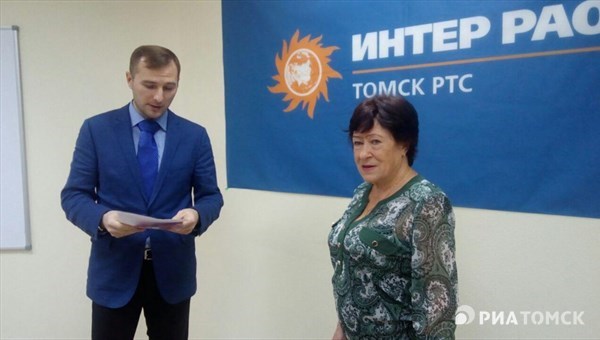 Томичка получила сертификат на путешествие за отсутствие долгов за ГВС